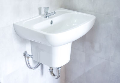High angle view of faucet in bathroom