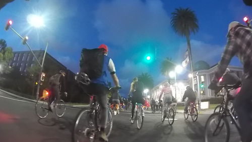 Man riding bicycle on road