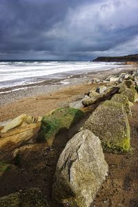 Scenic view of beach against sky