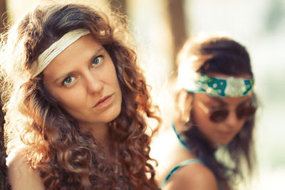 Portrait of woman standing outdoors