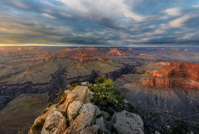 Scenic view of landscape against cloudy sky