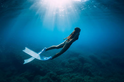 Man swimming in sea