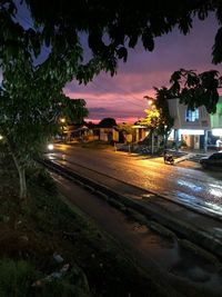 View of illuminated city at sunset