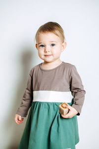 Baby fashion. unisex color clothes for babies. cute baby girls in neutral color palette cotton