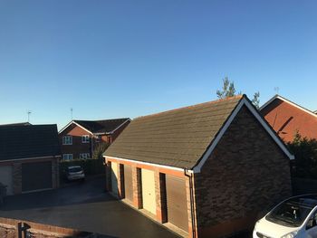 Houses against clear sky