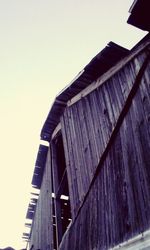 Low angle view of roof against clear sky