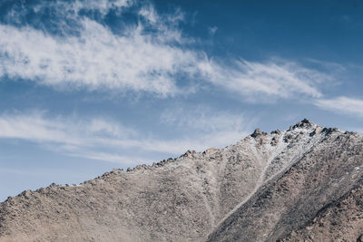 Rock formations on land against sky