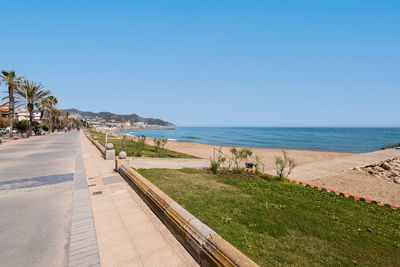 Scenic view of sea against clear blue sky