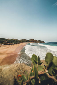Scenic view of sea against clear sky