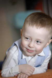 Portrait of smiling boy at home