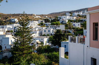 Houses against clear blue sky