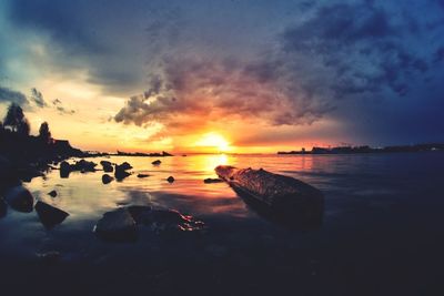 Scenic view of sea at sunset