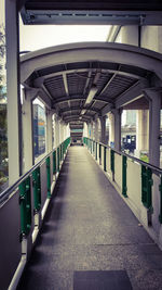 Empty elevated walkway in city
