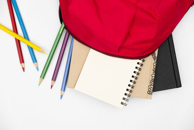 High angle view of multi colored pencils on table