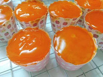 High angle view of orange fruits in container