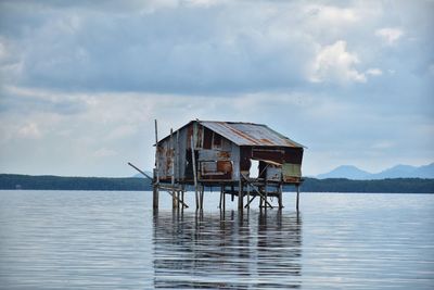 House on sea against sky