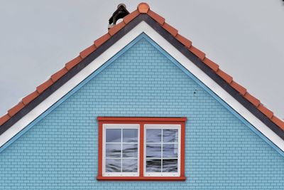 Low angle view of house against clear sky