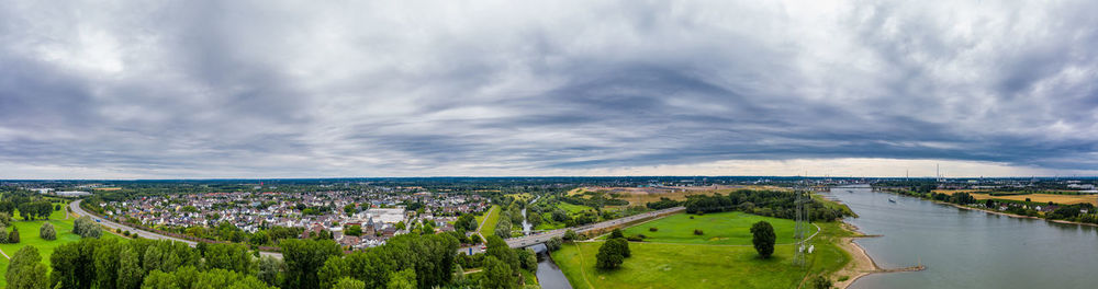 Panoramic view of the rhine and the a1 motorway bridge near leverkusen, germany. drone photography.