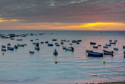 Scenic view of sea against sky during sunset