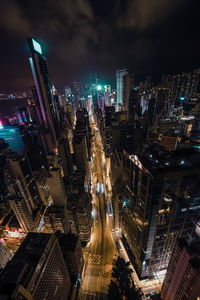 High angle view of city lit up at night