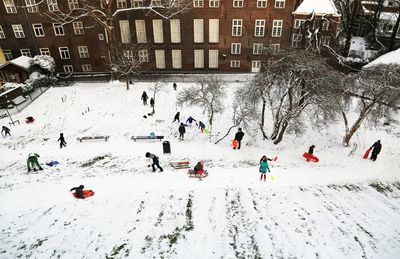 People on snow covered landscape