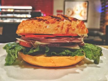 Close-up of burger in plate on table