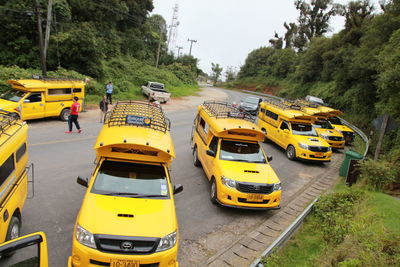 High angle view of yellow cars on road