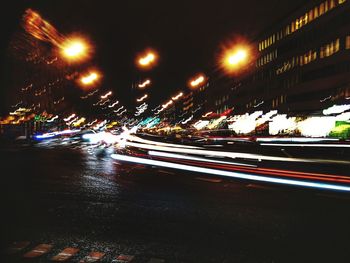 Light trails on street in city at night