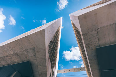 Low angle view of building against blue sky