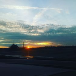 Road against sky during sunset