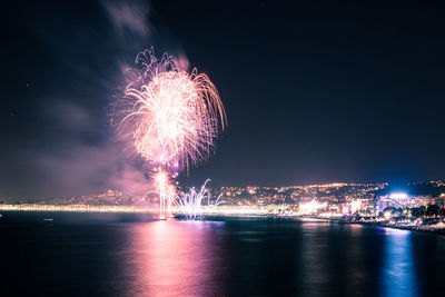 Firework display at night