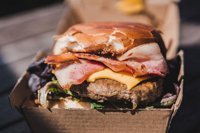 Close-up of burger in container