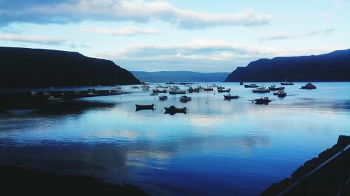 Scenic view of sea against cloudy sky