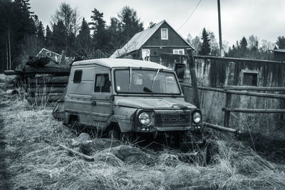 Car on house against sky