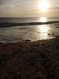 Scenic view of sea at sunset