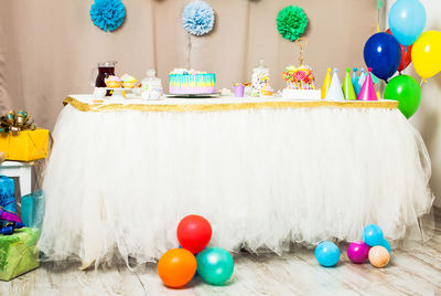 Multi colored balloons on table