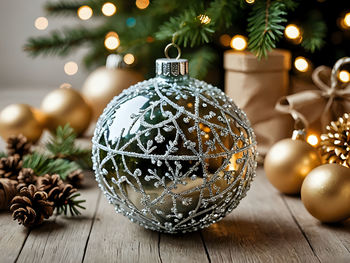 Close-up of christmas decorations on table