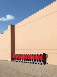 Shopping carts against wall