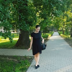 Full length of woman walking in park