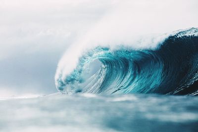 Close-up of sea wave against sky