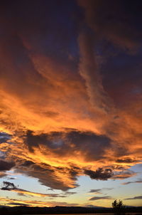 Low angle view of dramatic sky during sunset