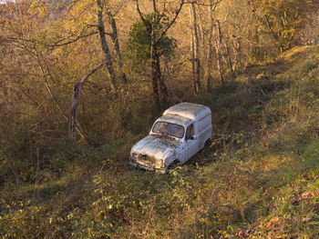 Abandoned boat in river