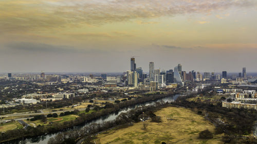 High angle view of cityscape against sky during sunset