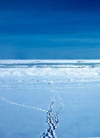 Close-up of blue sea against sky