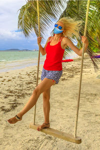 Full length of woman on beach