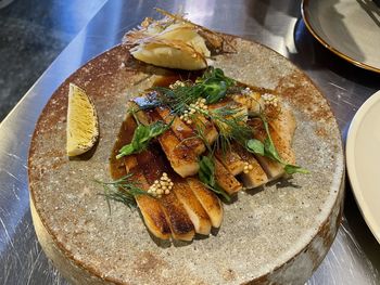 High angle view of meat in plate on table