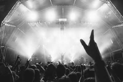 Rear view of people enjoying music concert