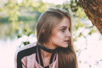 Close-up of young woman with eyes closed