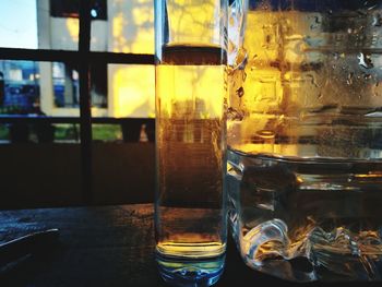 Close-up of beer glass on table