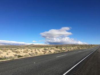 Road against blue sky